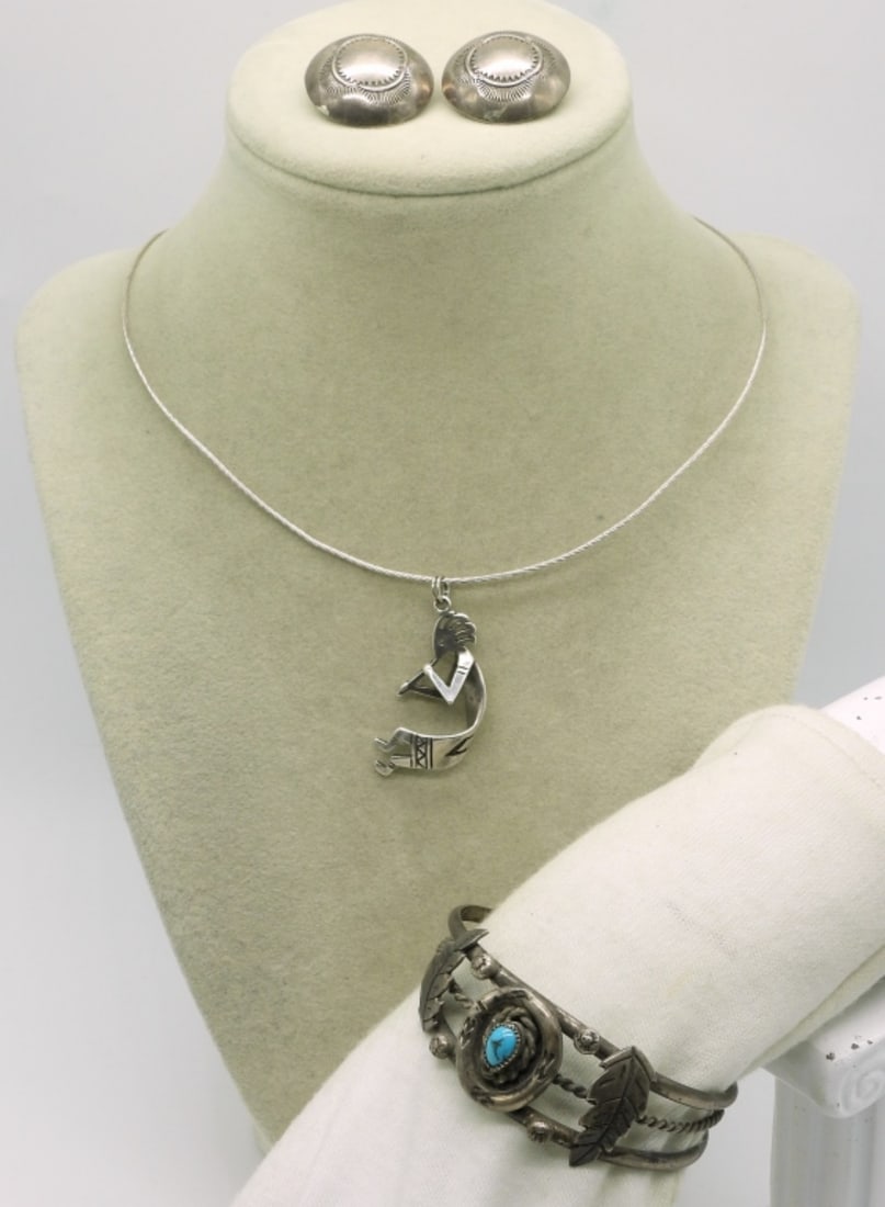 Kokopelli Necklace & Turquoise Cuff Bracelet: Sterling Kokopelli pendant on a 16" wire necklace. Sterling turquoise cuff bracelet. One pair clip on sterling earrings. (25.3 dwt) (6x4x2)