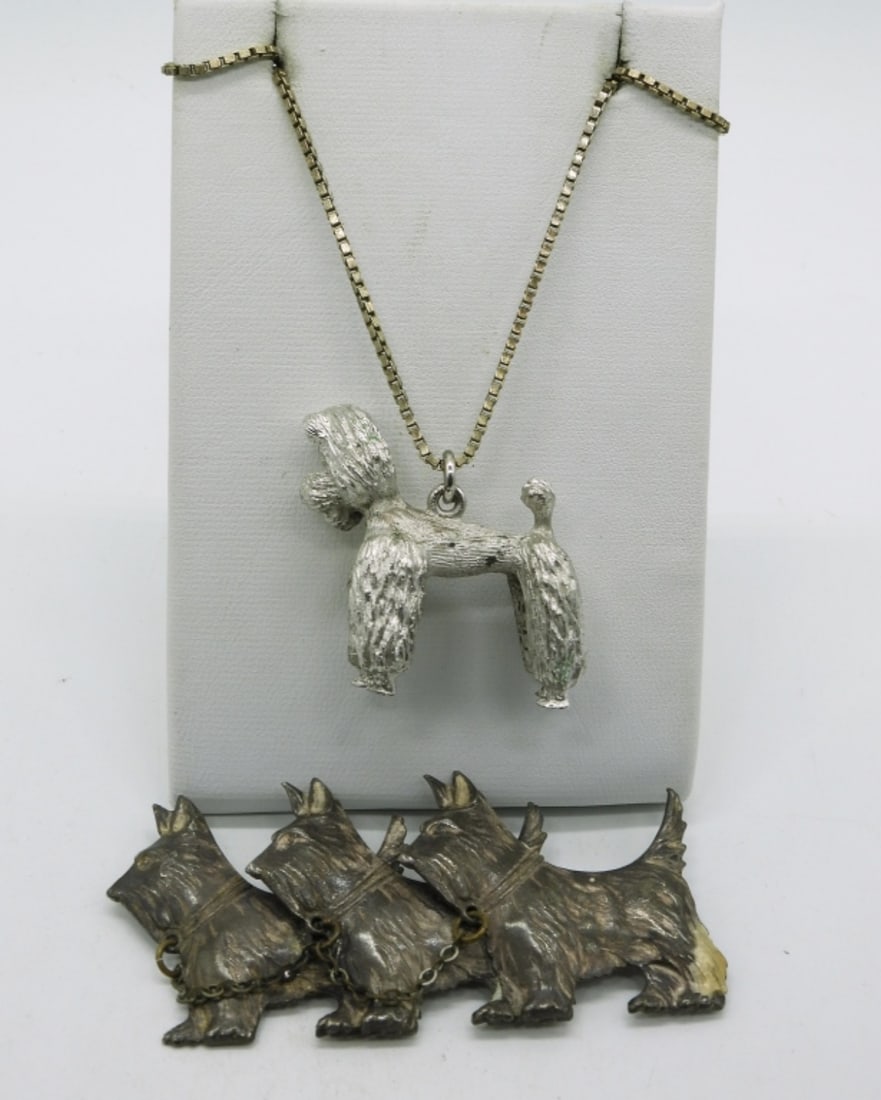 Sterling Dog Brooch & Pendant: Sterling dog brooch, 2.5" wide. Heavy sterling poodle pendant, 1". On a 20" sterling chain. (23 dwt) (6x4x2)