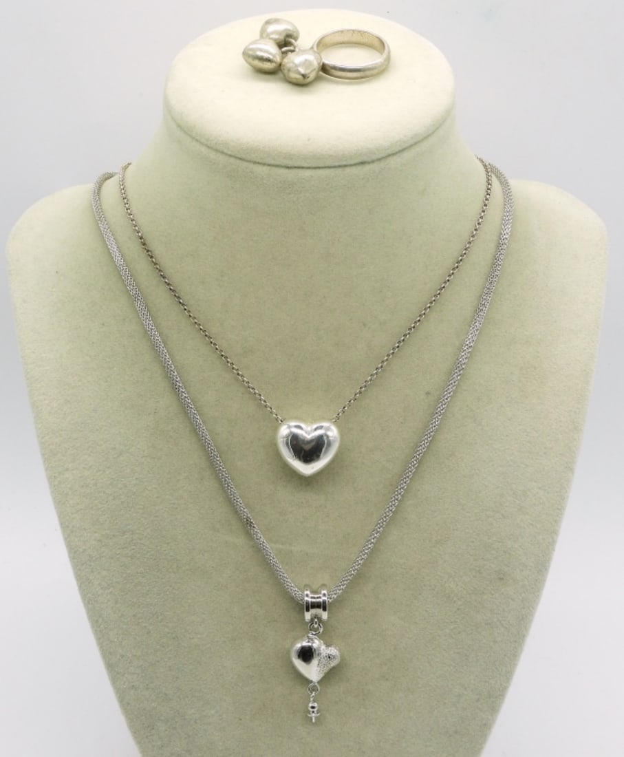 Sterling Heart Necklaces & Ring: Two sterling necklaces, 16" & 18". Sterling ring with dangling hearts, size 8 (15.9 dwt)