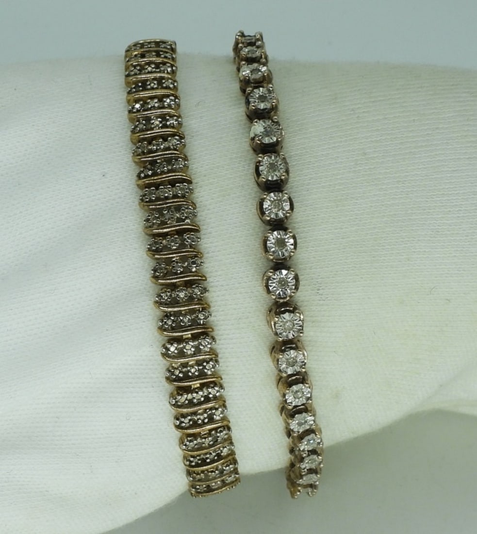 Two Sterling Gold Tone Tennis Bracelets: Two sterling gold tone tennis bracelets, 7 - 7.5" long. (16 dwt)