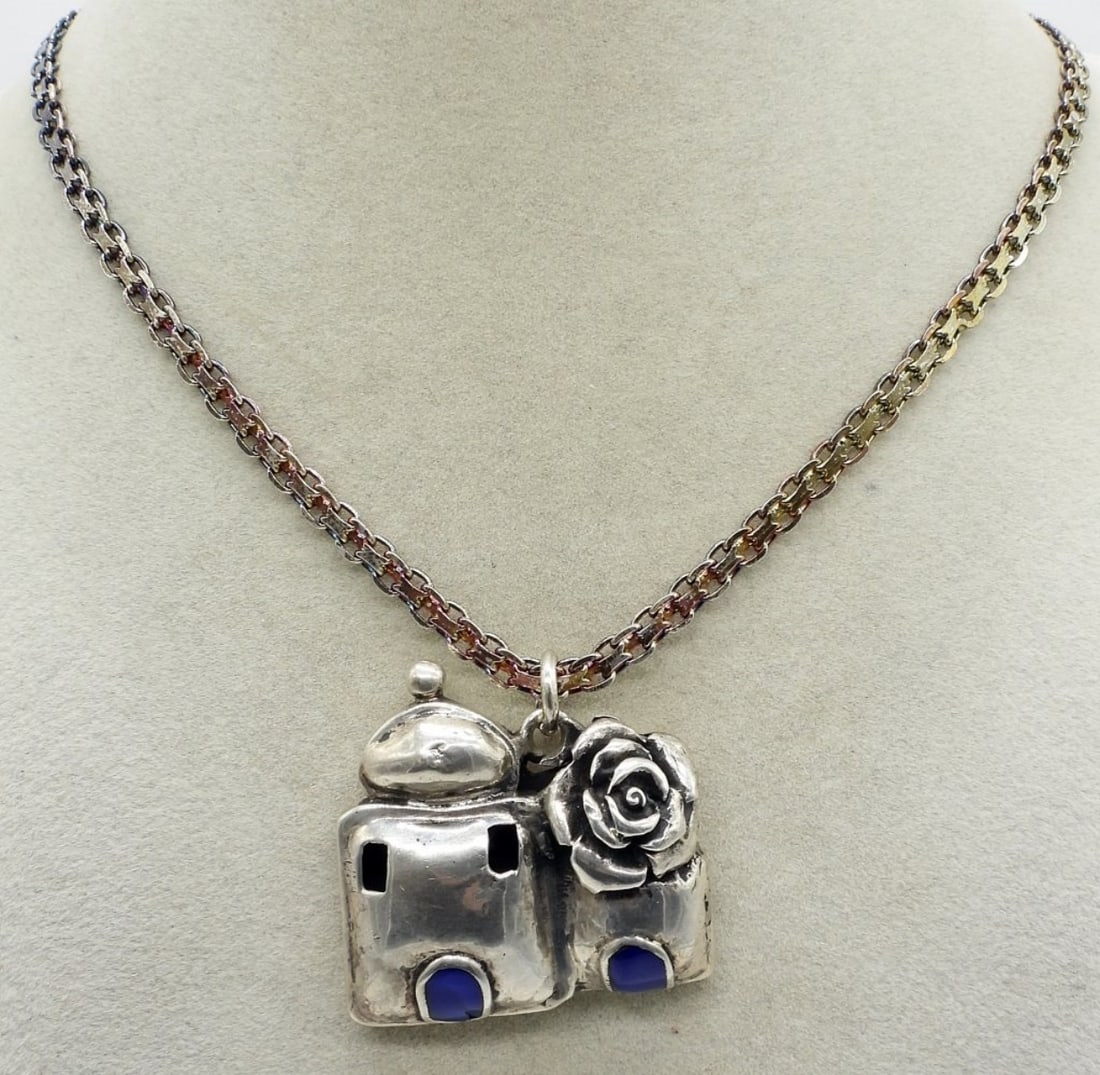 Vintage Puffed Sterling Necklace: Vintage puffed sterling pendant, 1.5", on a sterling 20" chain. (18.8 dwt)