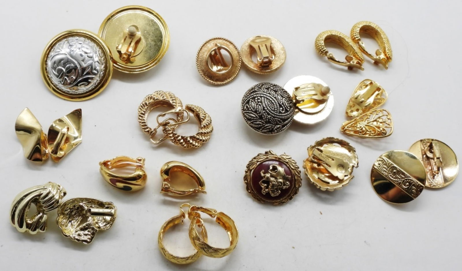 (12) Pair Gold Tone Clip On Earrings: vintageauctionsonline.com