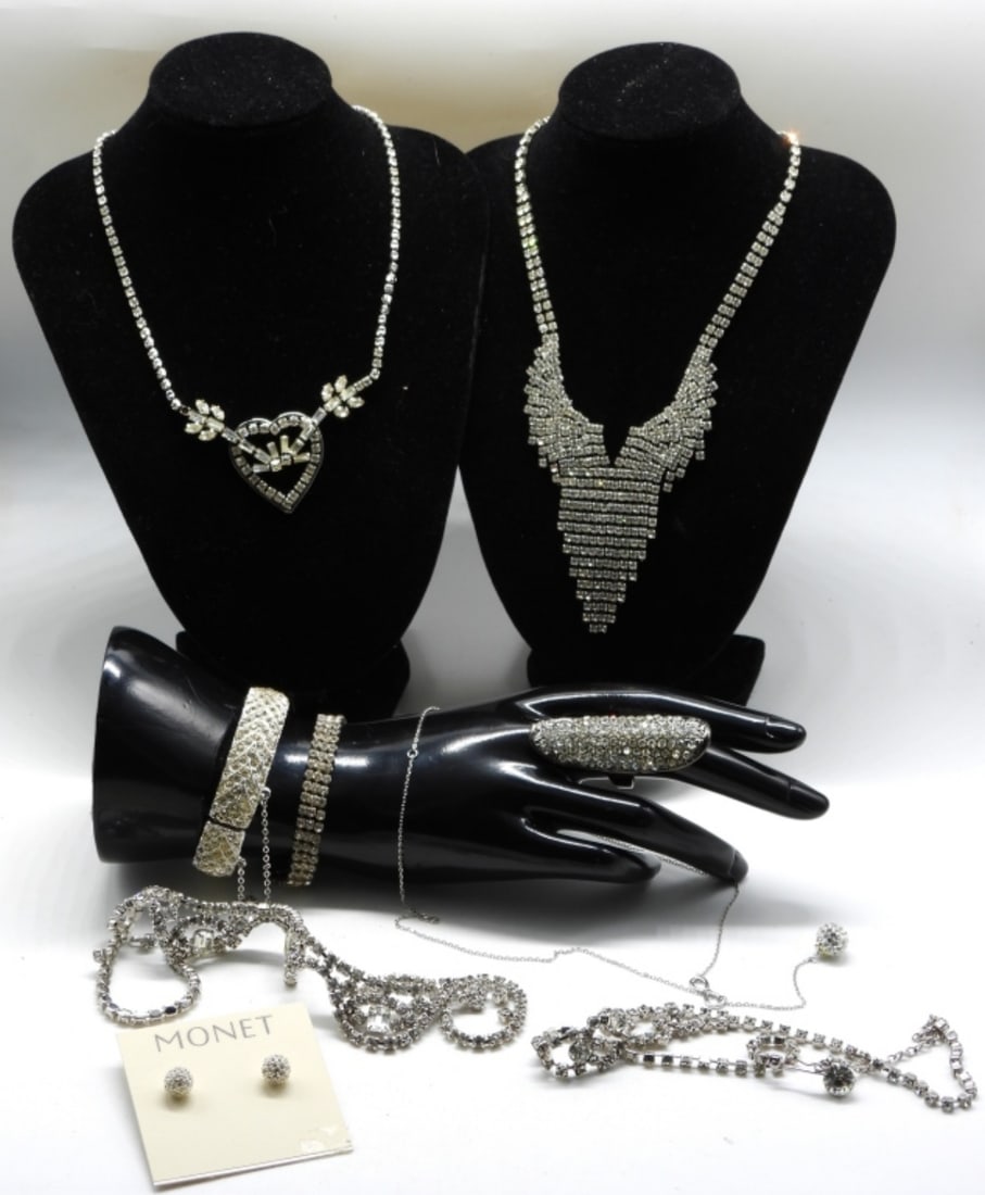 Clear Rhinestones: (5) Necklaces (2) Bracelets (1) Ring sized:6.5 & (1) Pair of post earrings