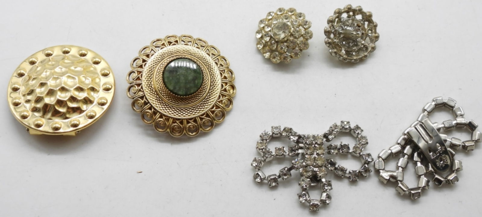 Stylish Pieces: (2) Scarf clips. (2) Rhinestone buttons (1) Pair of rhinestone shoe clips