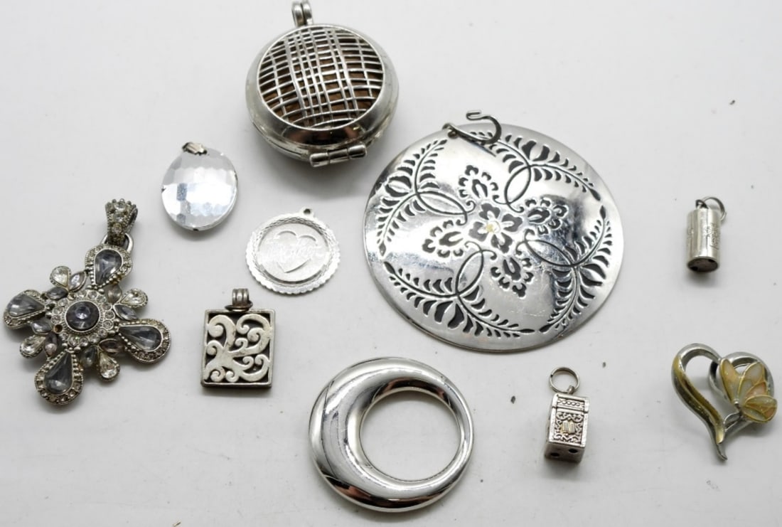 (10) Silver-Tone Pendants: Bid at the number one auction house, vintageauctionsonline.com