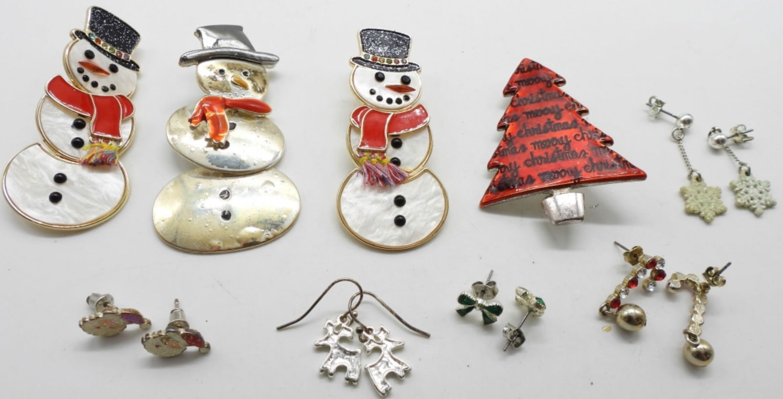 Christmas Mixed Lot: 1 snowman pendant, 1 brooch, and 6 pairs of pierced earrings