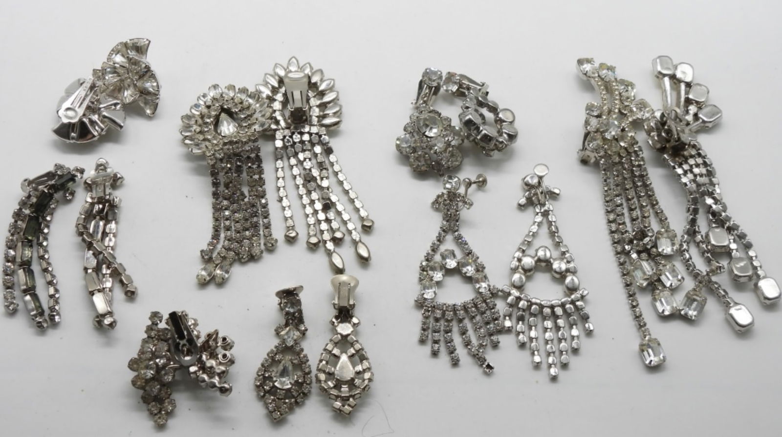 (8) Clear Rhinestone Earrings: Clip-ons and 1 set is screw-backs