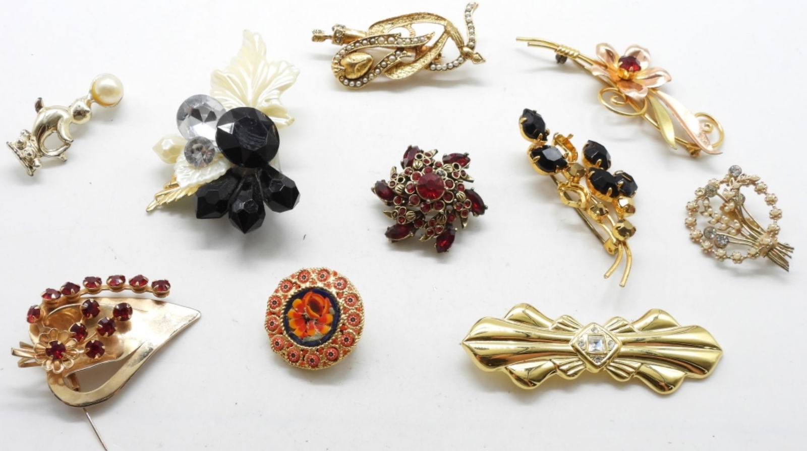 (10) Gold-Tone Brooches: Various brooches, different variety