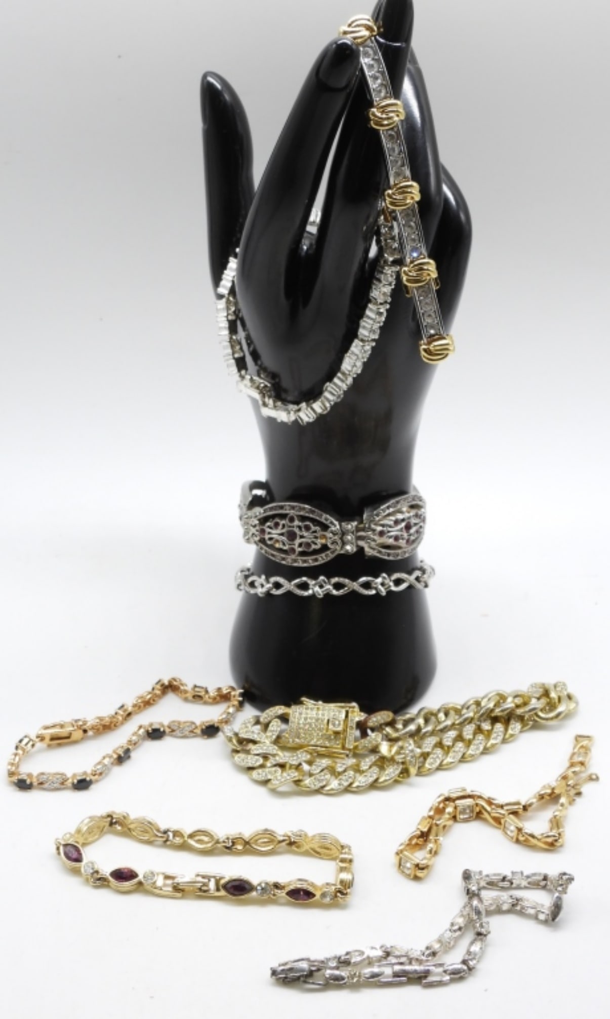 (9) Colored Rhinestone Bracelets: Get your vintage needs here at vintageauctionsonline.com