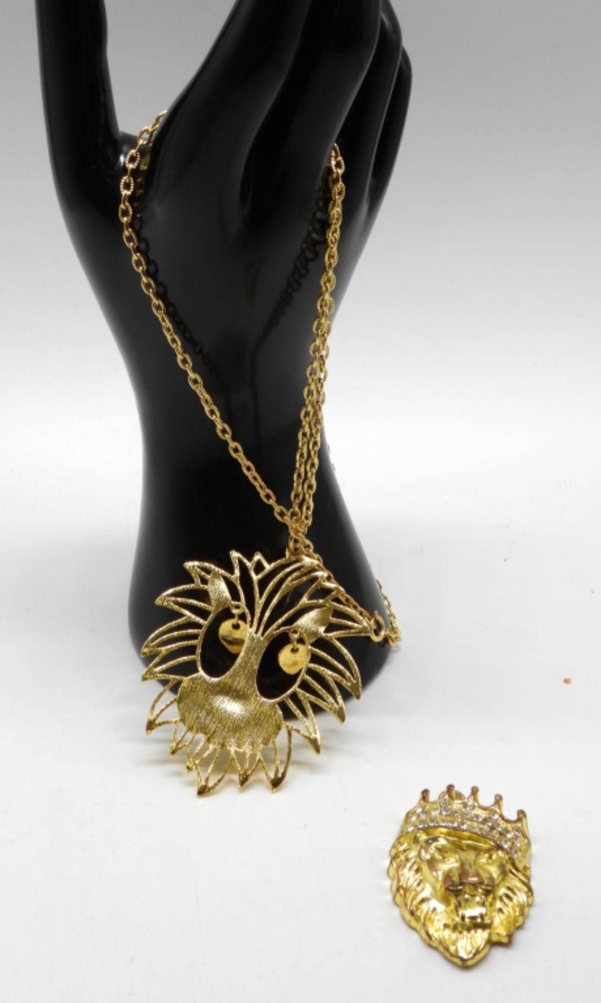 (2) Gold-Tone Lion Pendants (1) Chain: Check out our new site, vintageauctionsonline.com