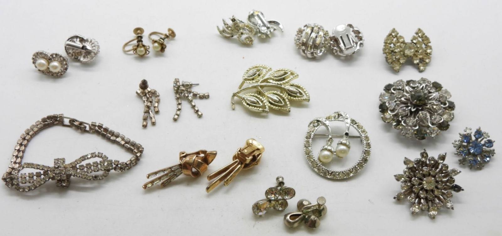 Mixed Lot Of Clear Rhinestone Jewelry: Get all of your vintage needs at vintageauctionsonline.com
