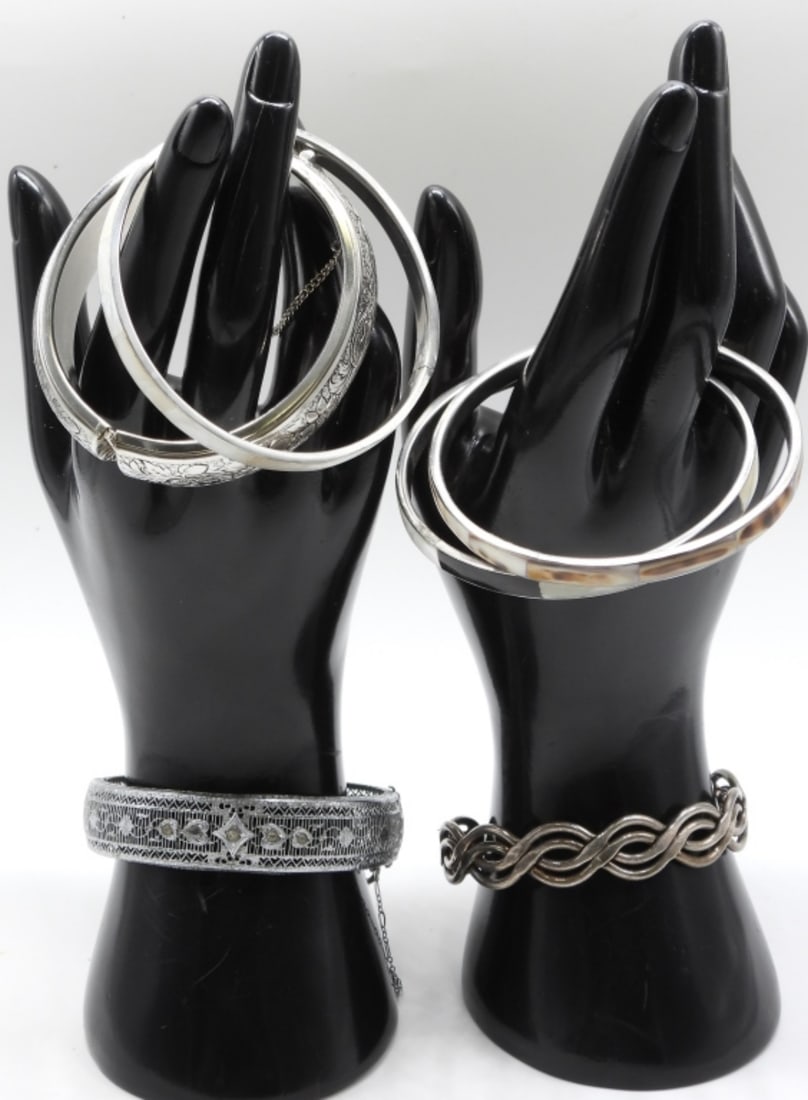 (5) Silver-Tone Bangle Bracelets: Beautiful bracelets
