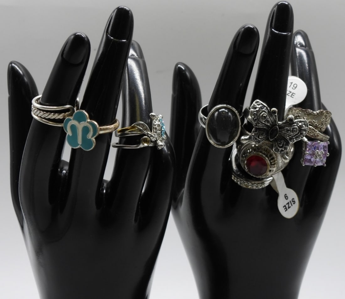 (10) Silver-Tone Fashion Rings: Sizes range from 5-10. Some rings are missing stones.