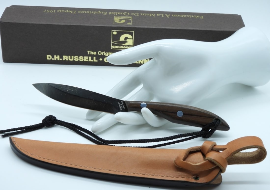 New D.H.Russell Grohmann Belt Knife: Beautiful full tang and comfortable grip. This knife is well-balanced. It comes with a leather sheath and is in the original box.