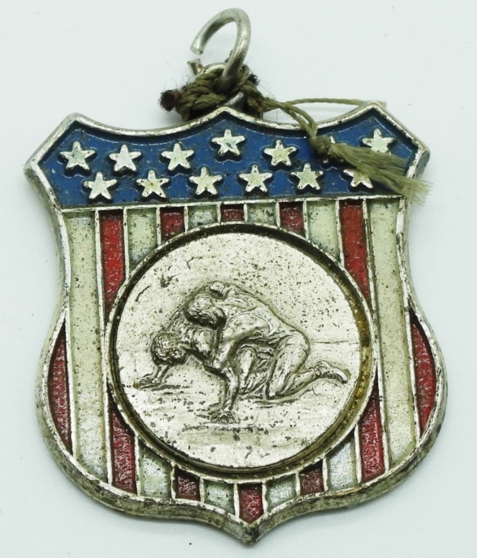 U.S.A. Wrestling Metal Pendant: HEV is engraved on the back