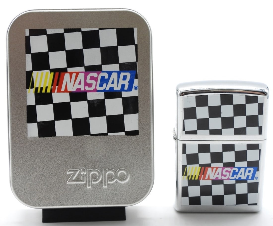 1999 NASCAR Checkered Flag Zippo Unfired: The back of the Zippo is engraved. Please see the photos. Comes in a tin case