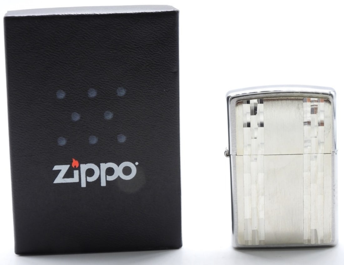 2011 Chrome Design Zippo, Sealed: Comes in a Zippo box, sealed