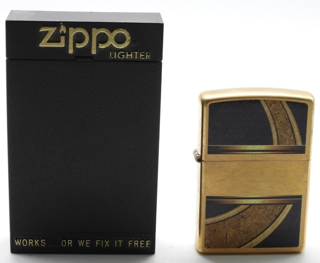 Zippo Windproof Brushed Brass Gold & Black: 2015. Comes in a box. Sealed