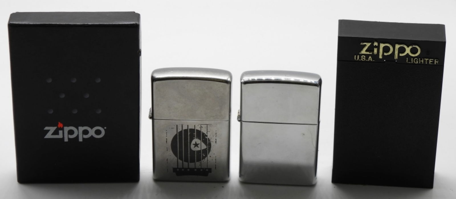 (2) Zippo Lighters Unfired: 1-1999 Blank Zippo sealed. 1- 2008 Guitar with Pick Zippo unfired. Both come in a box