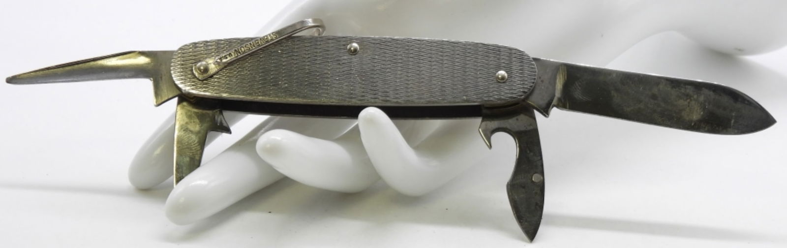 Stevenson Multi-Tool Knife: Has no rust, does not look too worn.