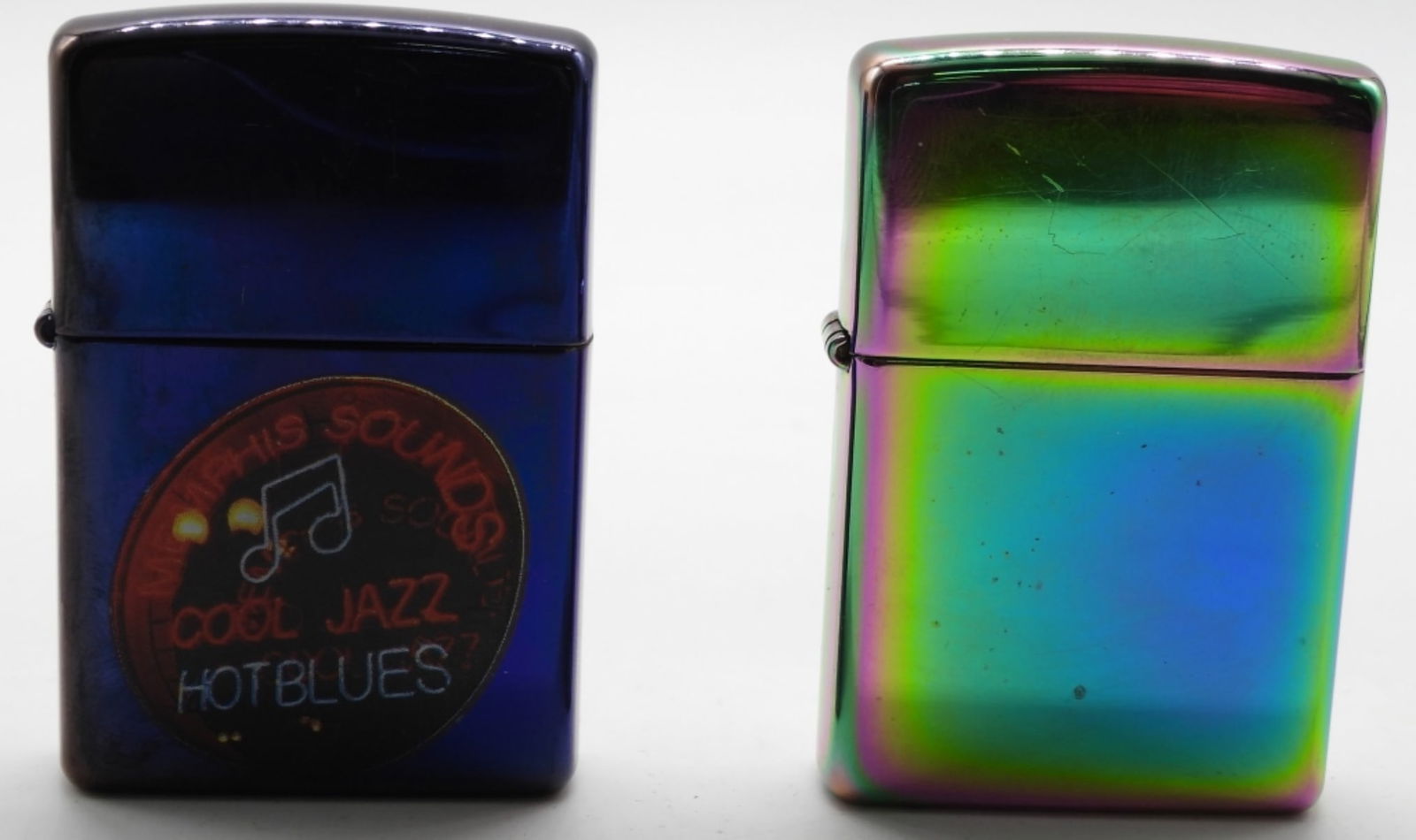 (2) Colorful Zippos 2003 & 2004 Fired: Both are chrome polish style. 1-2004, 1- 2003 Memphis Sounds Cool Jazz Hot blues Zippo. None comes in a box. Both have been fired