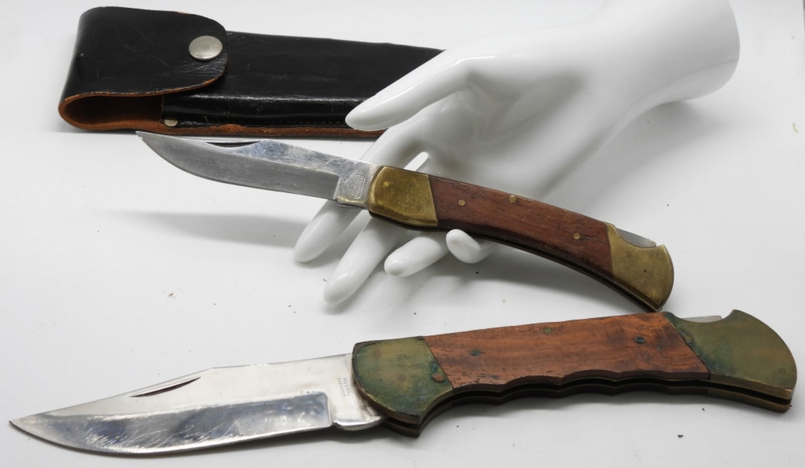 (2) Large Pakistani Folding Knives: Both large (1) with leather sheath