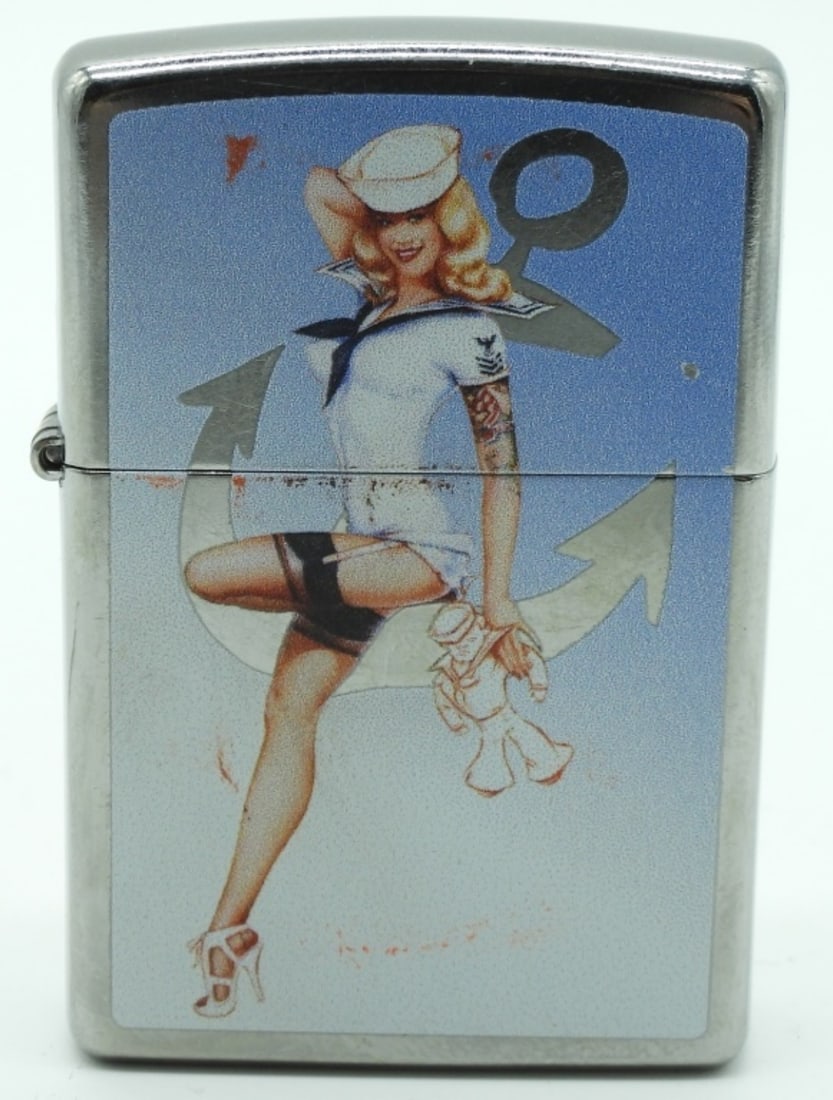 Sailor Girl Pin-Up 2018 Zippo Sealed: Does not come with a box. Sealed. The front of the Zippo has scuff marks from rubbing against other Zippos.