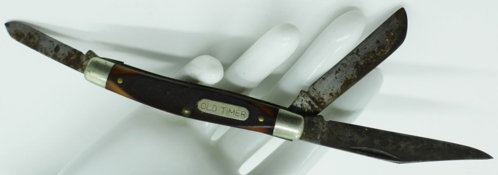 Schrade Old Timer Three-Blade Pocket Knife: Used. Has a non-slip grip