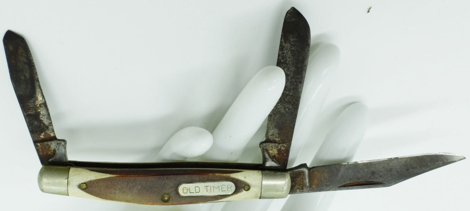 Schrade Old Timer Three-Blade Pocket Knife: Used. Has a non-slip grip