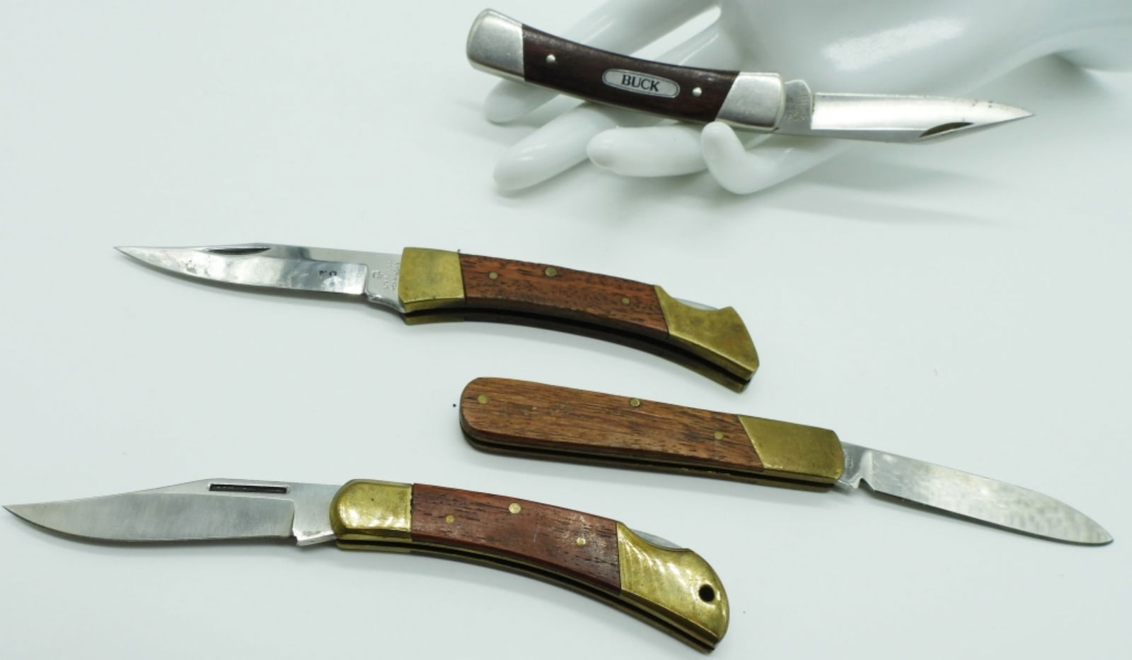 (4) Single-Blade Lock-Back Pocket Knives: 1) Buck 704, the rest are made in China, 7 Hong Kong