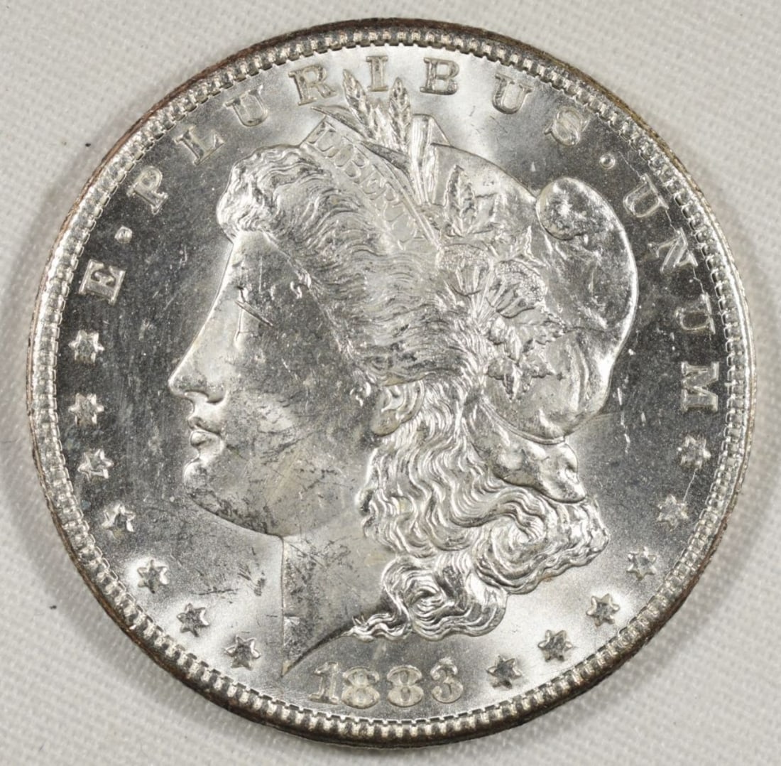 1883-CC Morgan Dollar: Visit us on Facebook
