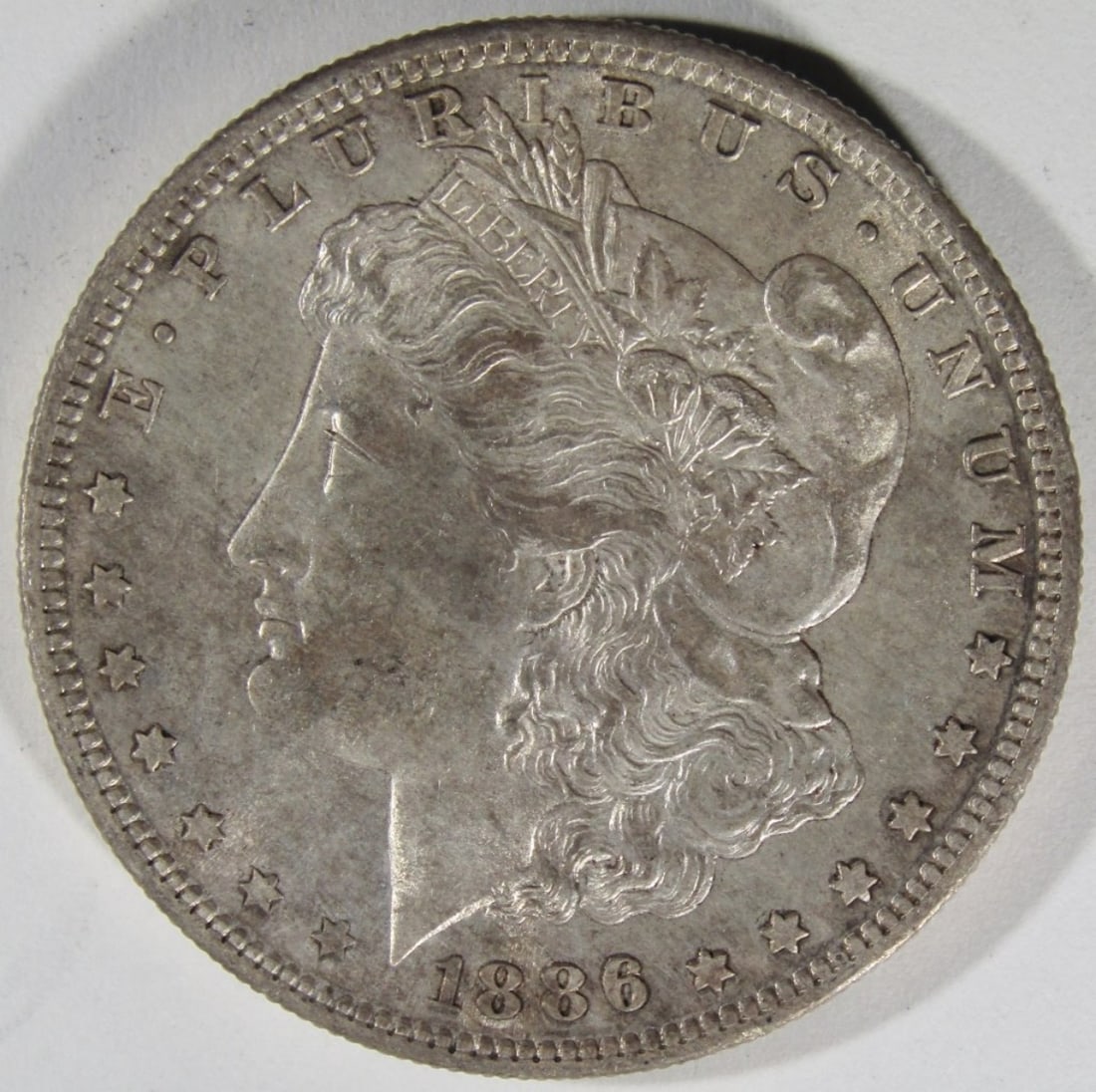 1886-S Morgan Dollar: Follow us on Facebook, Instagram, X, and TikTok.