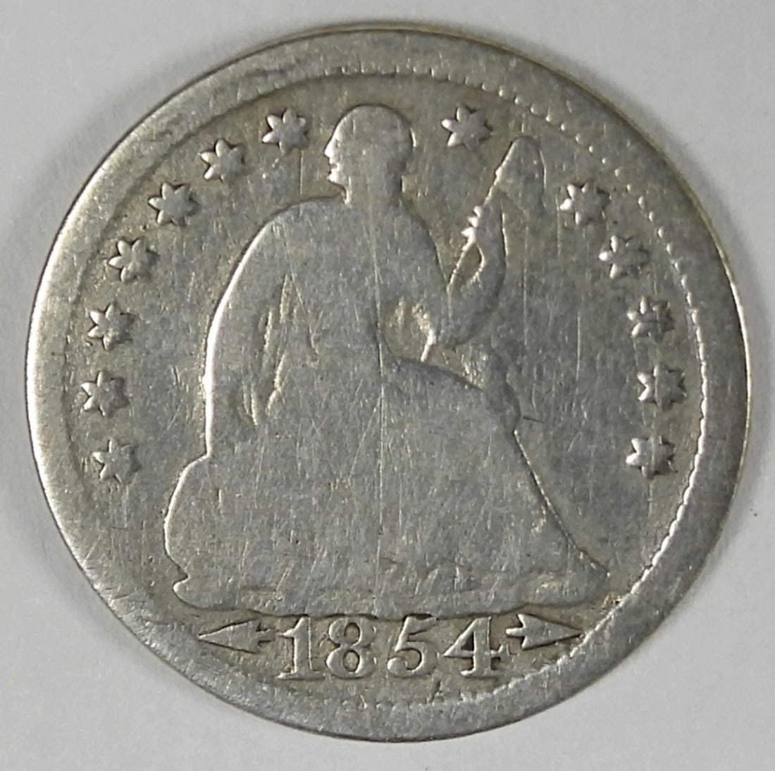 1854 Seated Half Dime (1 of 2)