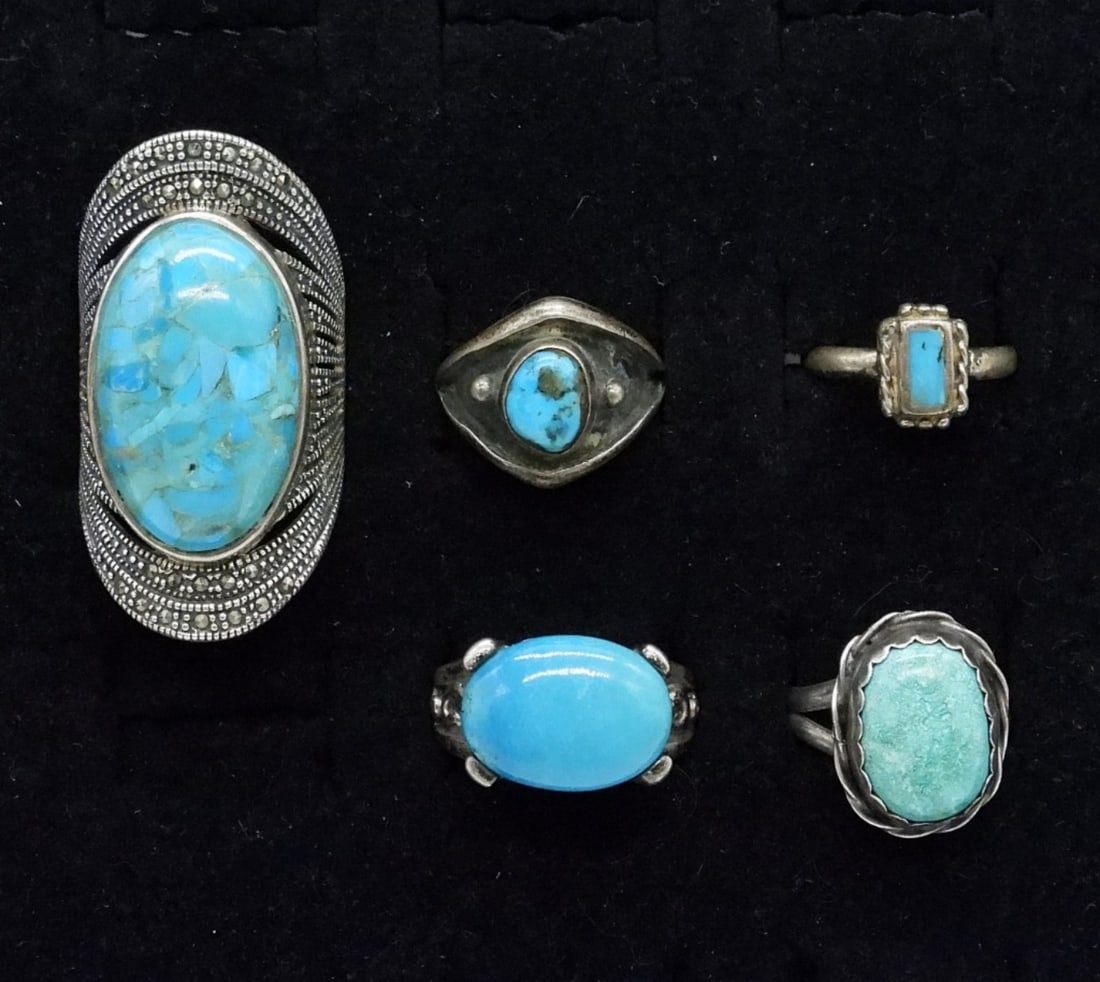 5 Sterling Turquoise Gemstone Rings: Five sterling rings with Turquoise gemstones. Sizes 4, 5, 8, 10. No special markings. (20 dwt)