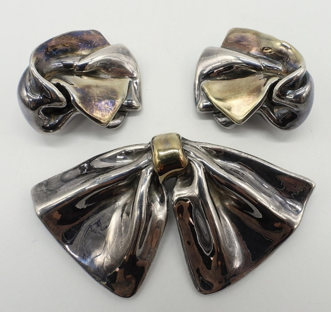 Puffed Sterling Earrings & Brooch: Puffed sterling clip on earrings, 2" long. Puffed sterling Bow brooch/pendant, 4" wide, 2" long. (28.5 dwt)