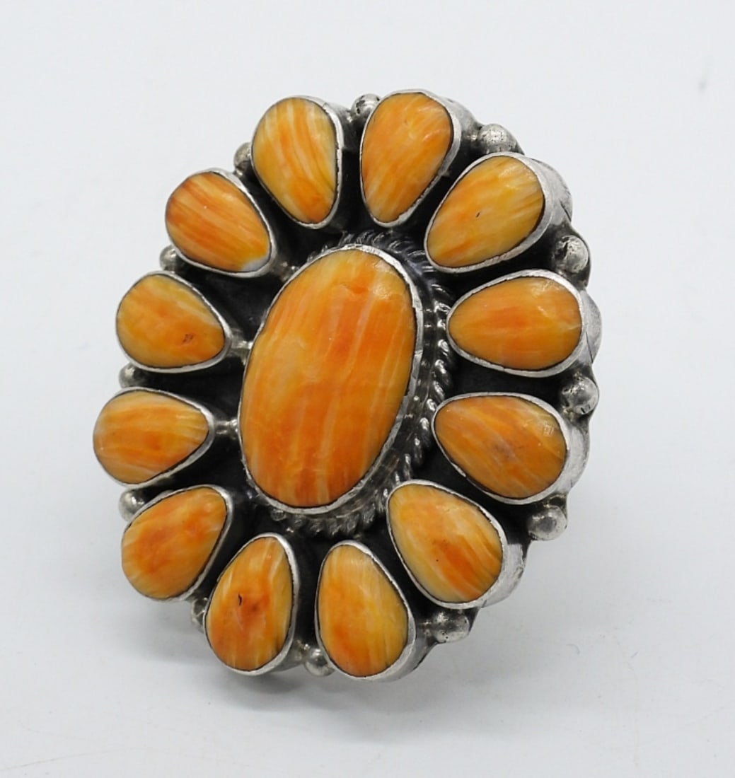 Orange Spiney Oyster Shell 925 Ring: Orange Spiney Oyster Shell gemstone, sterling ring. Ring size 6.5, top of ring measures 1.5" long. (12 dwt)
