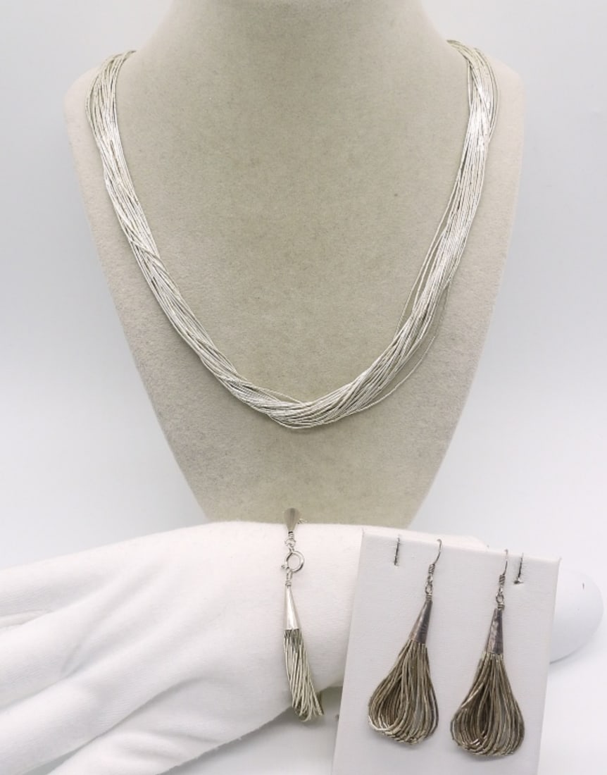 Liquid Sterling Necklace, Bracelet, Earrings: Liquid sterling necklace, 30". Bracelet, 7" long. Pierced earrings hang 2.5". (37.9 dwt)