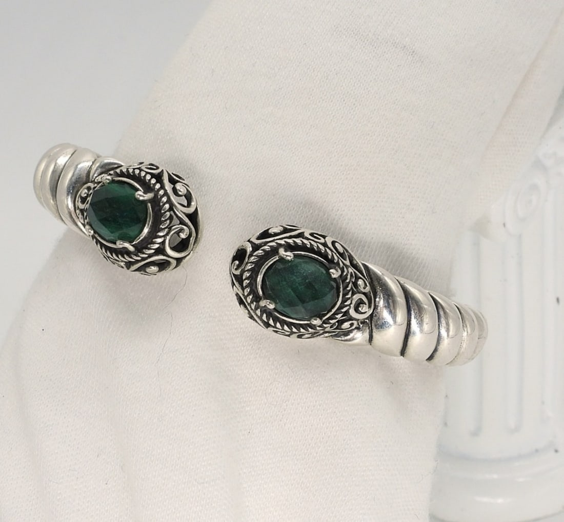 Carolyn Pollack Sterling Hinged Bracelet: Carolyn Pollack sterling hinged bracelet with green stones. (28 dwt)