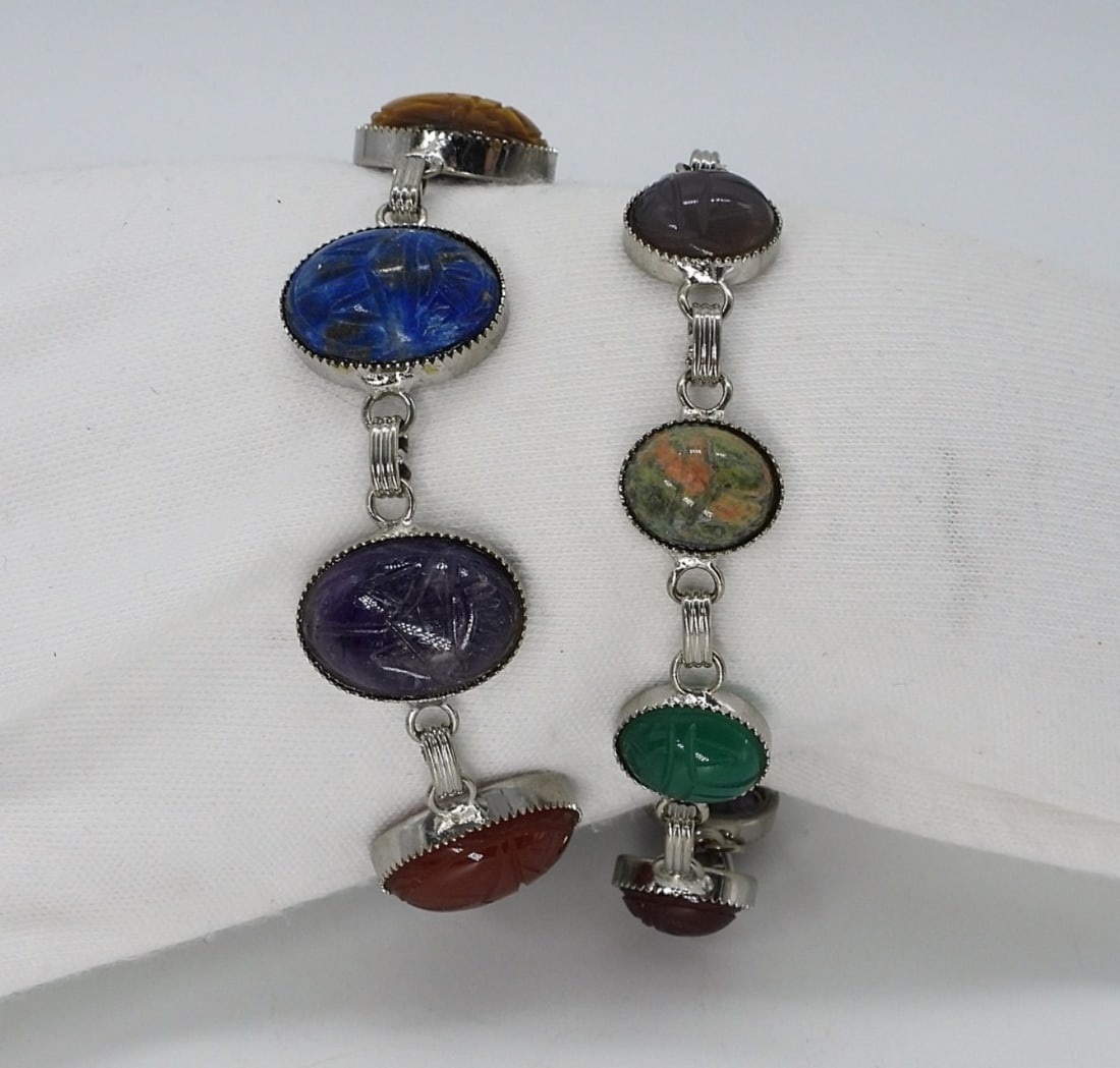 2 Sterling Gemstone Scarab Bracelets: Two sterling bracelets with multi gemstone scarabs. Both 7" long. (18 dwt)