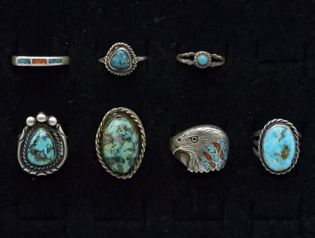 7 Sterling Turquoise Gemstone Rings: Seven sterling turquoise gemstone rings. Sizes 4.5-10 (20 dwt)