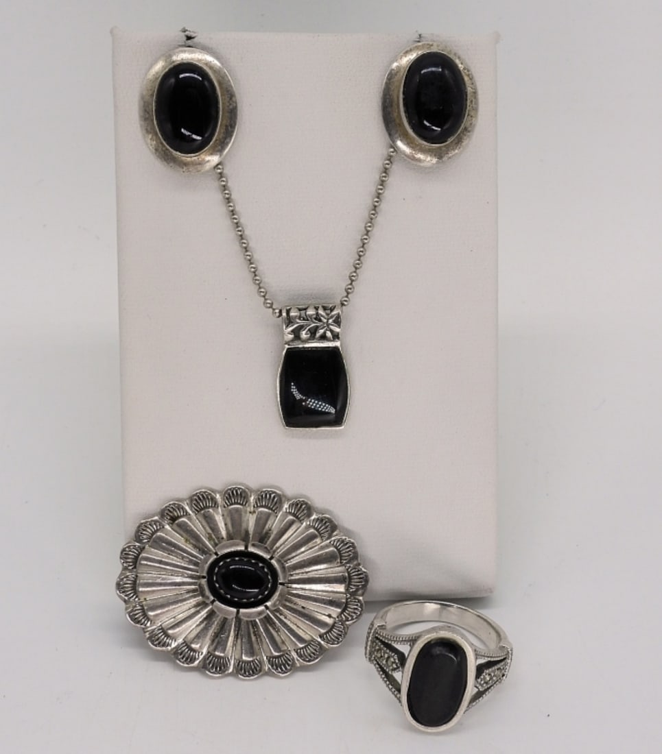 Black Onyx Sterling Set: All sterling with black onyx gemstones. Necklace is 24" long. Brooch is 2" wide. Ring is size 7.5 (16 dwt)