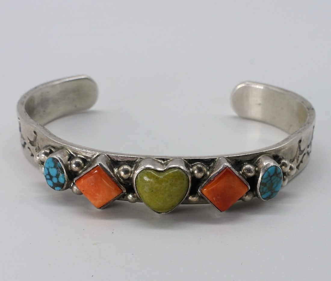 Tonya J Rafael Navajo 925 Cuff Bracelet: Tonya J. Rafael, Navajo sterling cuff bracelet with gemstones. Signed. (20.9 dwt)