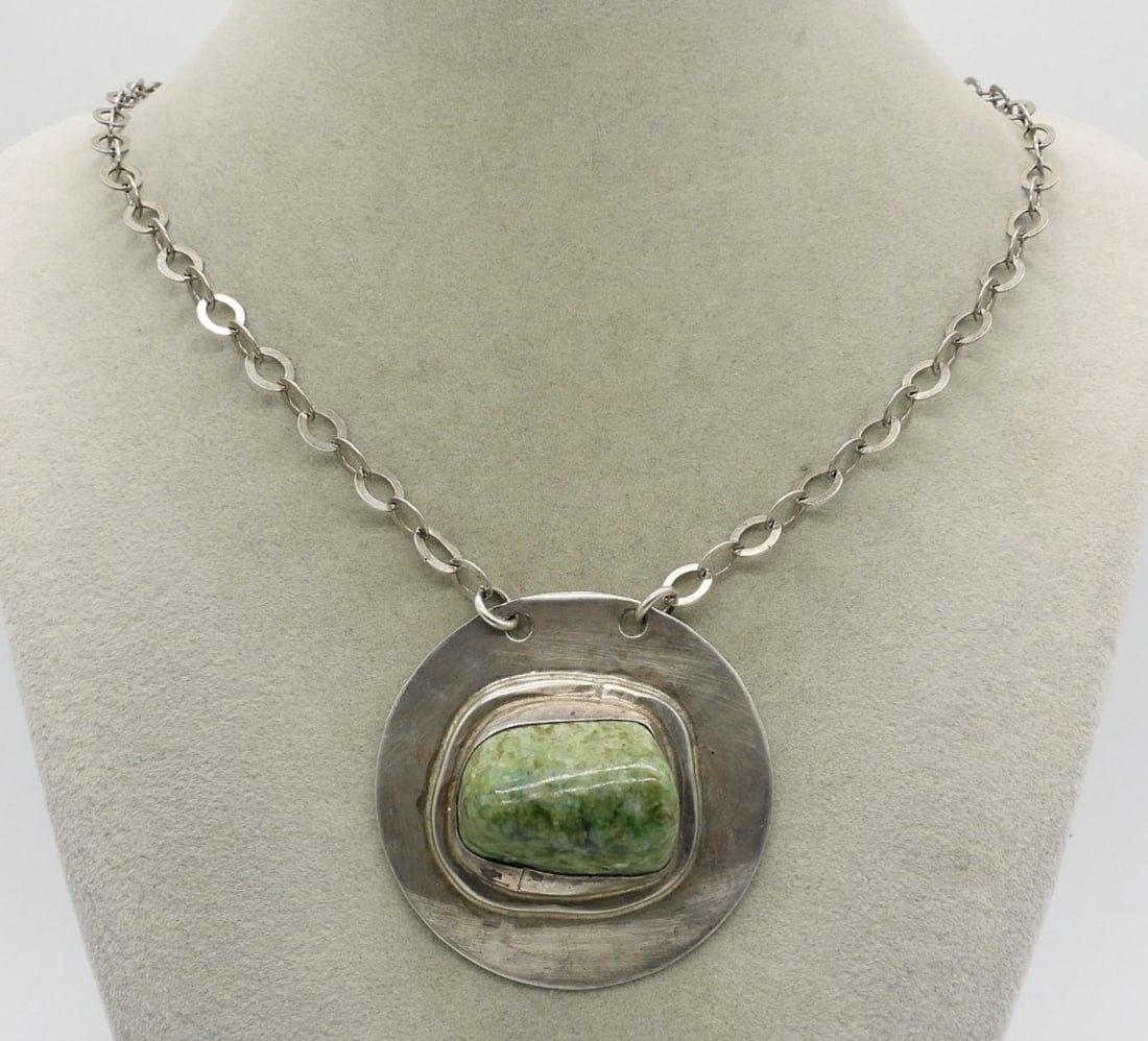 Rafael Canada Sterling Statement Necklace: "Rafael Canada Sterling" Marked pendant with large green gemstone. Attached to a 28" sterling chain. (28 dwt)