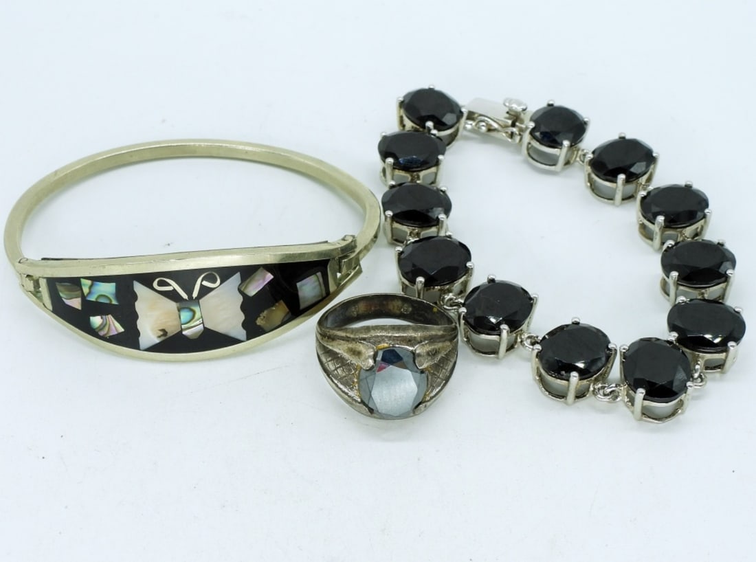 Vintage Hematite, Abalone & Onyx Jewelry: Vintage sterling ring with large hematite gemstone, size 9. Vintage sterling inlaid abalone bracelet. Black onyx gemstone & sterling bracelet, 7.5" long. (28 dwt) (6x4x2)