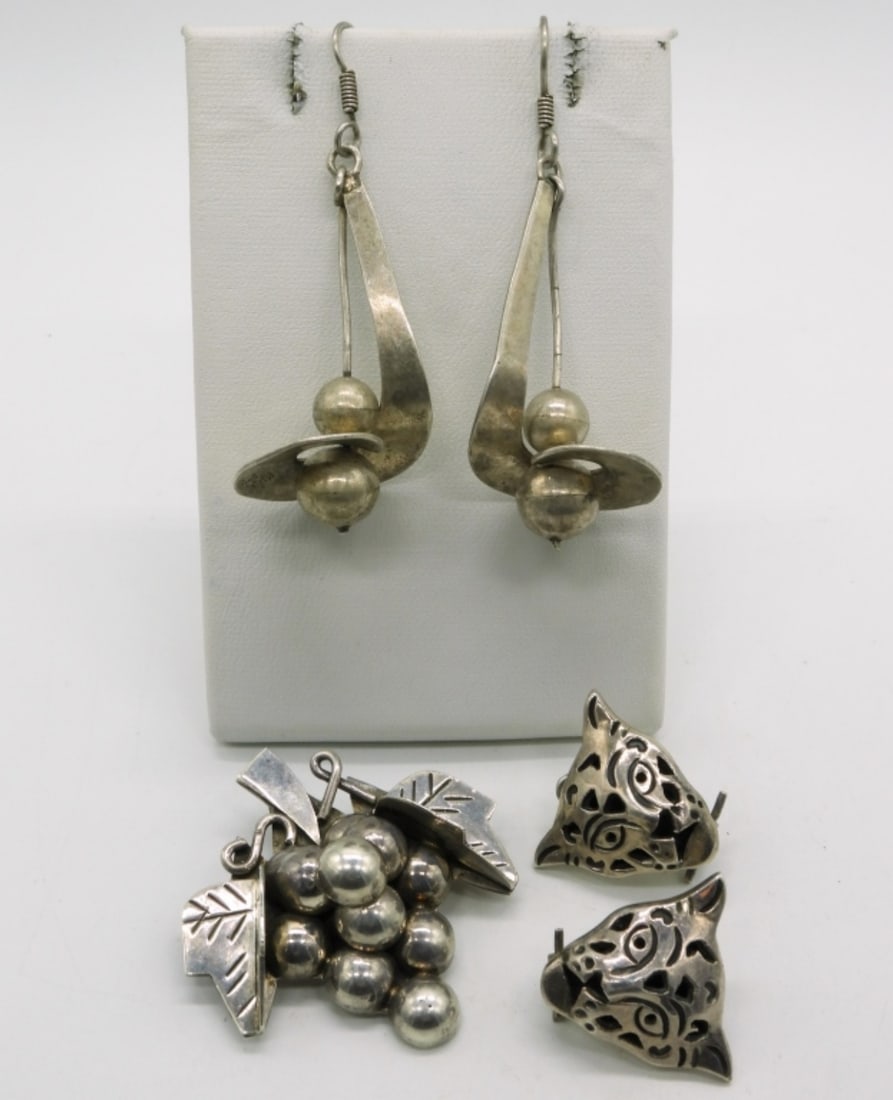 Taxco 925 Earrings and Grape Brooch: Two pair of sterling pierced Taxco earrings, 1" - 2.5". Taxco grape brooch, 2" long. (26.9 dwt)