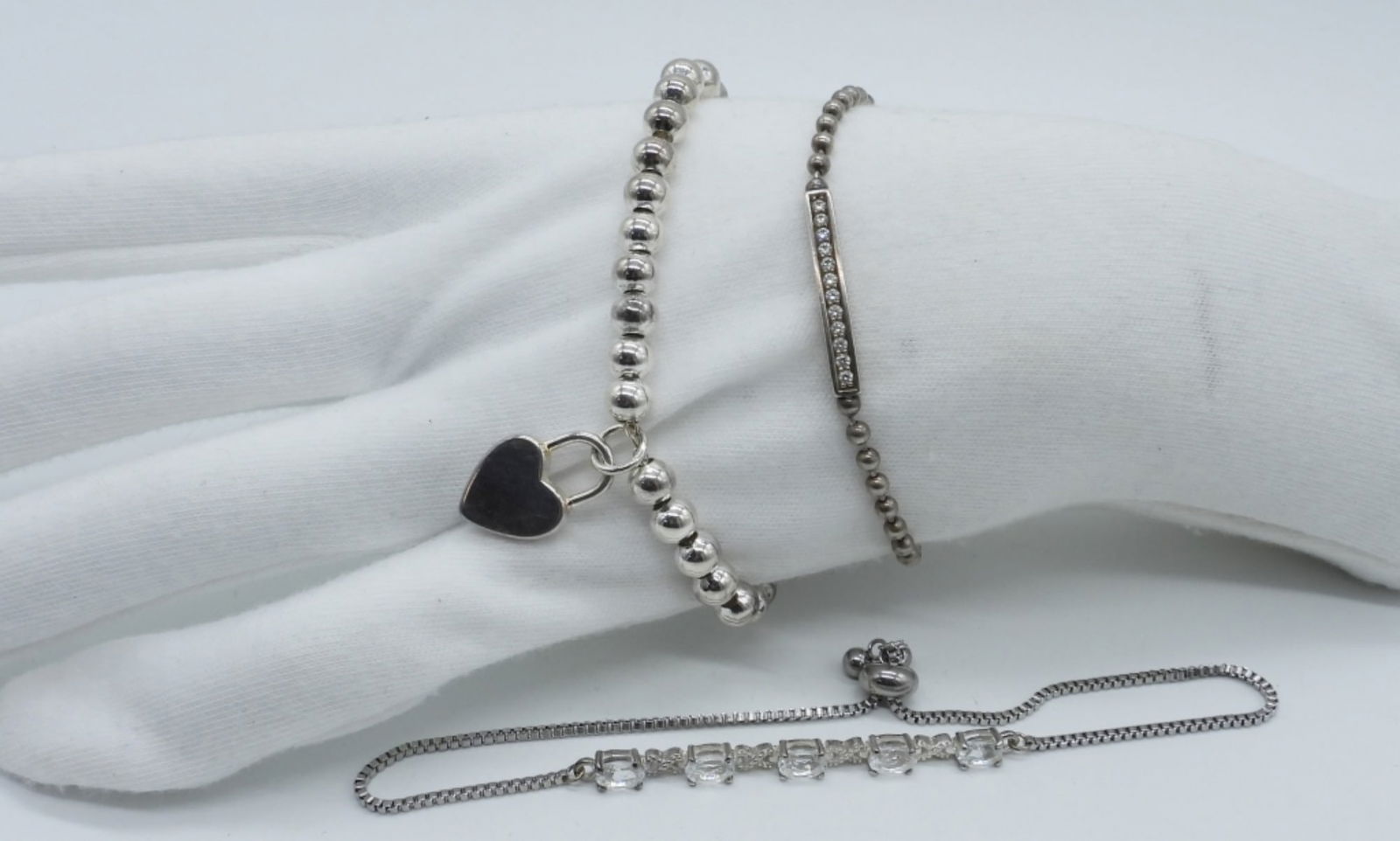 3 Sterling Bracelets & Anklets: Three sterling bracelets / anklets. 6-10" long. (16.2 dwt)