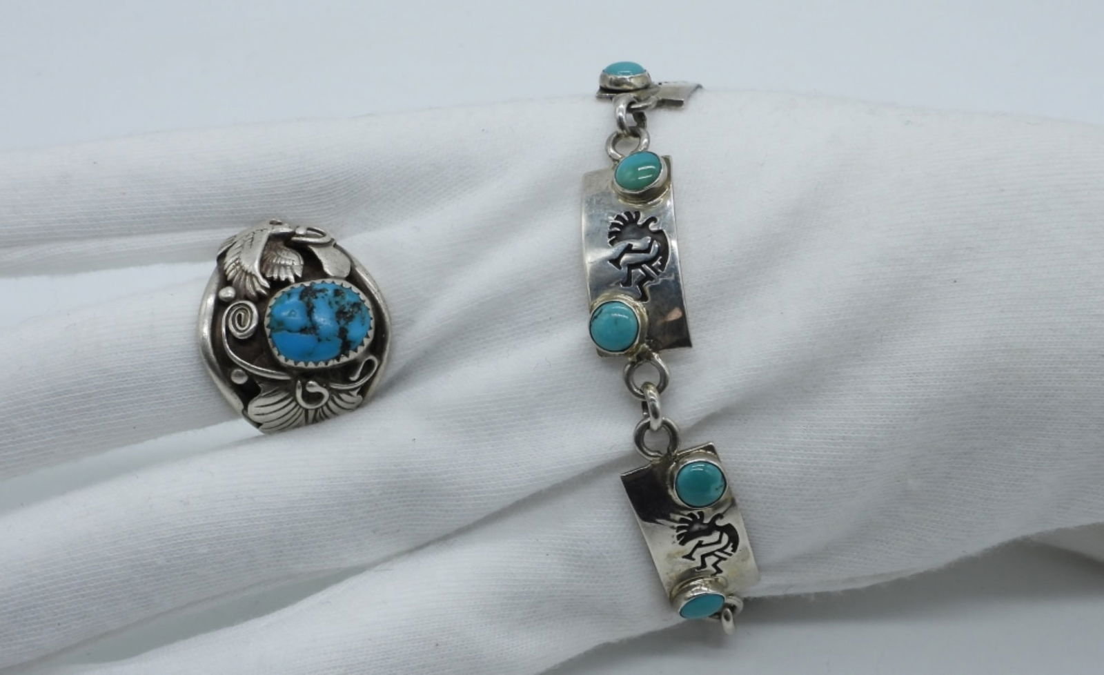 Navajo 925 Eagle Ring & Kokopelli Bracelet: Navajo sterling eagle ring with turquoise gemstone, size 9. Marked "RB" inside of a bear and 925. Kokopelli sterling bracelet with turquoise gemstones, 8" long. Marked "Sterling BB". (20 dwt)