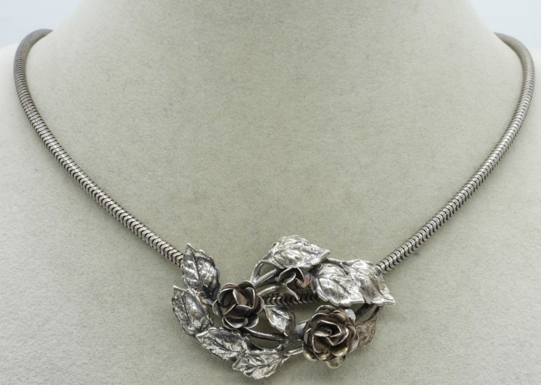Dane Craft Sterling Rose Necklace: Dane Craft sterling slider rose pendant (2" wide - 1" long) on a 15" sterling chain. (19.3 dwt)
