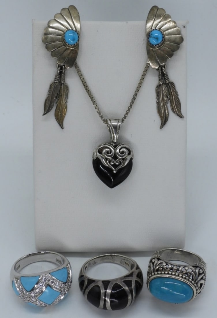 Turquoise & Black Onyx 925 Rings, Earrings: Three sterling rings with turquoise and black onyx gemstones, sizes 5 & 8. Sterling and Black Onyx Necklace, 24" long. Pierced feather turquoise earrings, 2" long. (22 dwt)