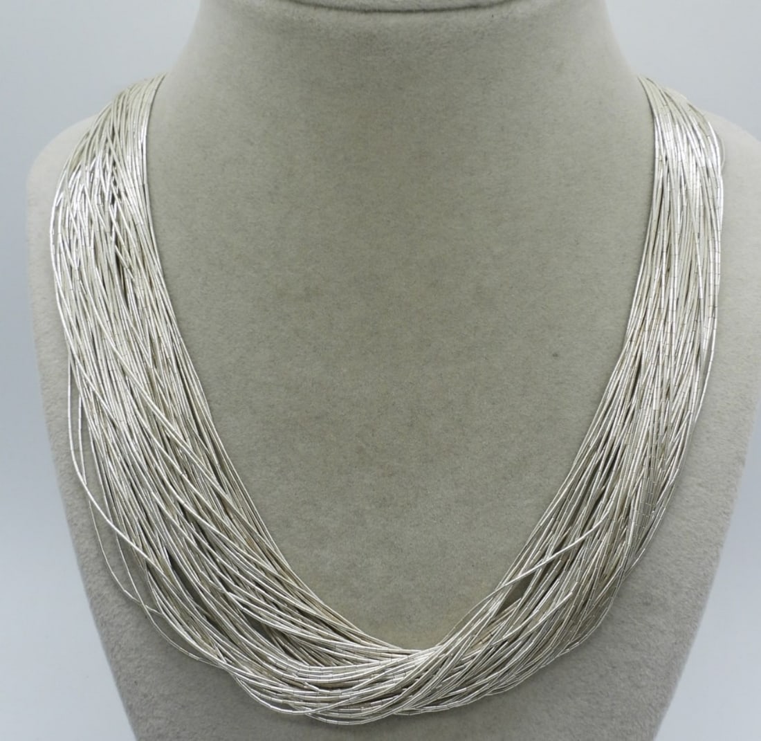 Carolyn Pollack Liquid Sterling Necklace: Carolyn Pollack liquid sterling 26" long. Marked with Carolyn Pollacks' makers mark and 925. Very Heavy. (47.8 dwt)